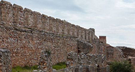Stone wall of the ruined old fortress