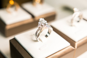 Stunning diamond wedding ring on display box