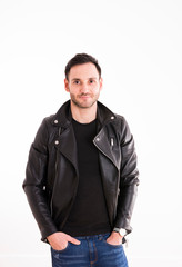 Fototapeta premium portrait of young man with black jacket, handsome guy, rock style..