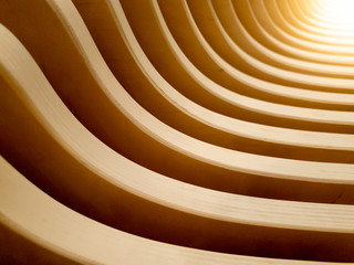 Beautiful abstract background of wooden curved lines and bright sun light