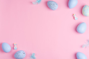 Fototapeta na wymiar Beautiful Easter pastel blue eggs on pink background with copy space