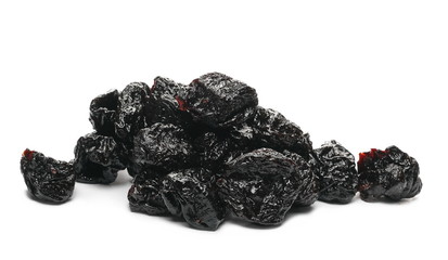 Prunes, dry plums pile isolated on white background
