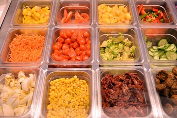Salad bar with vegetables in the restaurant, healthy food.