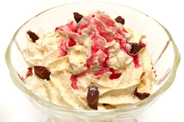 dessert of whipped cream with chocolate and syrup
