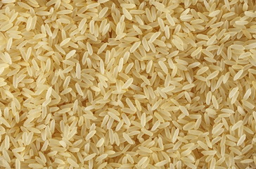 Parboiled rice background and texture