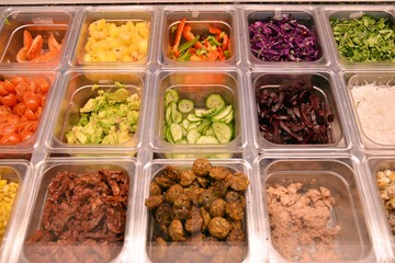 Salad bar with vegetables in the restaurant, healthy food.