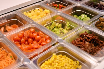 Salad bar with vegetables in the restaurant, healthy food.