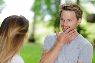 Fototapeta premium happy couple talking in the countryside