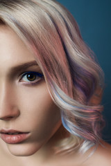 Naklejka premium beauty portrait of young woman with colored hair