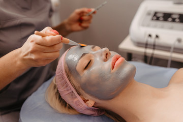 face of women getting a spa treatment