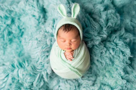 newborn boy. photo session of a newborn. newborn baby in a Bunny hat