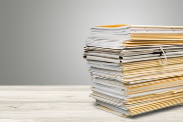 File folders with documents on the office desk