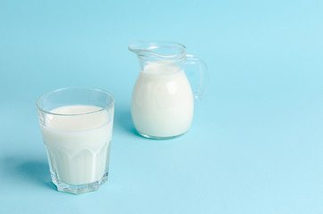 Home-made fermented drink - kefir or Bulgaros on a blue background with copy space.