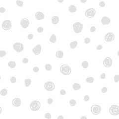 Dot doodles seamless pattern. Hand drawn circles texture background.