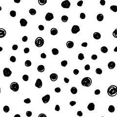 Dot doodles seamless pattern. Hand drawn circles texture background.