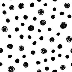 Dot doodles seamless pattern. Hand drawn circles texture background.