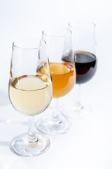 Fortified wine from Andalusia, Spain, different types of sherry in glasses on white background