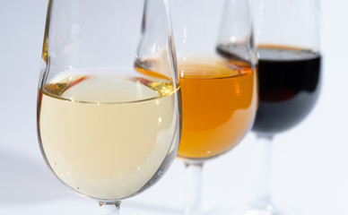 Fortified wine from Andalusia, Spain, different types of sherry in glasses on white background