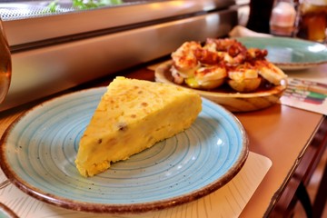Close-up detail of a piece of traditional Spanish potato tortilla