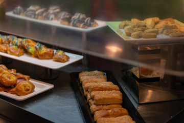 Different pastries on the table of a self-service restaurant
