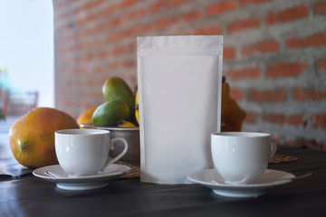 Mocap for your logo or brand. packaging of coffee, tea as a template for design. Box with a clean side. Travel theme still life with fruit