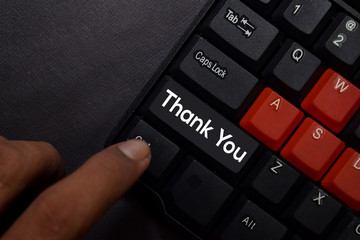 Thank You isolated on laptop keyboard background