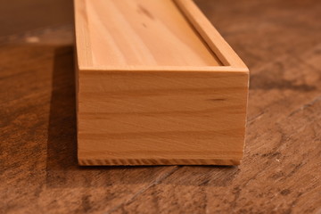Naklejka na ściany i meble wooden case with dominoes