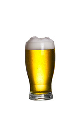 Glass of lager beer with cap of foam. Glass of ale isolated on white background - image