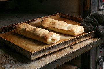 Freshly baked homemade rolled bread buns