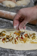 Process of making Italian appetizer stuffed bread, making of simple savory stuffed bread, serie of photos