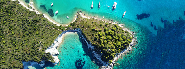 Aerial drone ultra wide photo of tropical Caribbean bay with white sand beach and beautiful...
