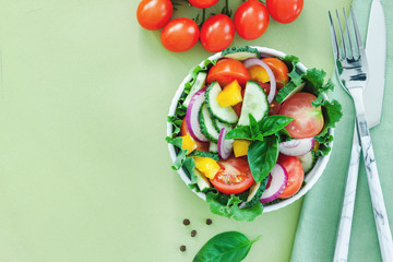 Green salad with tomato and fresh vegetables