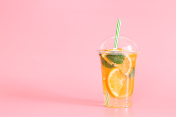 Glass of fresh orange juice with mint. Top view