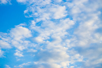 Naklejka na ściany i meble Mostly white cloud against blue sky nature background evening scene