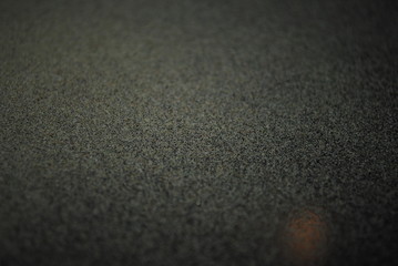 Crystals of kief leftover on black trim tray backdrop after medical marijuana/cannabis harvest