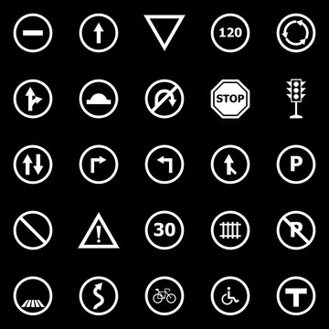 Road sign icons on black background