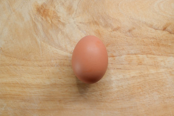 hen egg put on wood cutting board in kitchen prepare cooking food