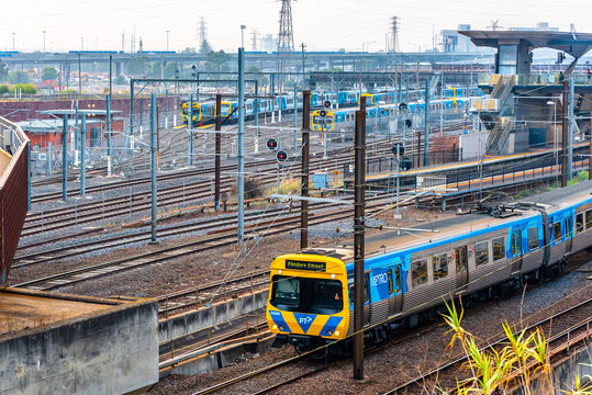 Melbourne, Victoria, Australia, January 9th, 2020: Many Metro trains on the tracks near North Melbourne Train Station on a heavy smoke haze day.
