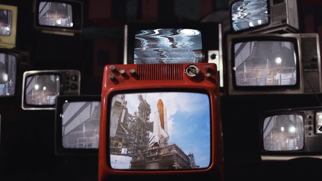 Lift-off of the Space Shuttle Discovery which launched the Hubble Space Telescope into orbit, Seen on a Retro TV Wall.  Elements of this video furnished by NASA.