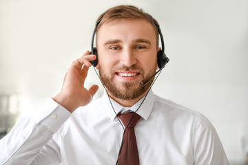 Portrait of male technical support agent in office