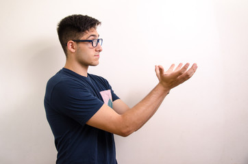 Young man pointing with his fingers