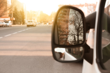 View of car side mirror, closeup