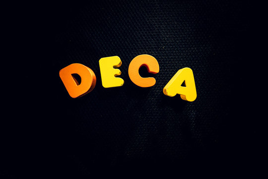 deca metric labels on black background