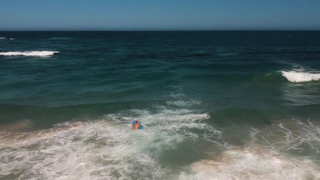 christmass vibes on beach surfing with a christmass head