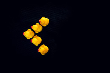 Rubber ducks representing social issues