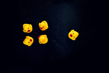 Rubber ducks representing social issues