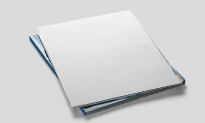 Stack of different blank magazines on the desk