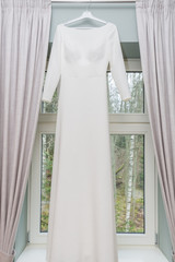 City Cesis, Latvia. Womans wedding dress and decoration. Casual style.