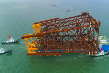 Moving and transporting the supports of oil platform.