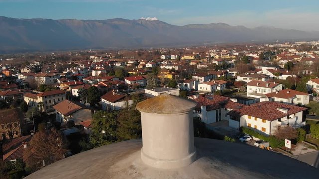 Aerial view Sacile back move view to Alps